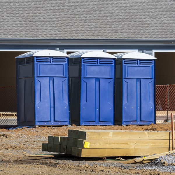 what is the cost difference between standard and deluxe portable toilet rentals in Almena WI